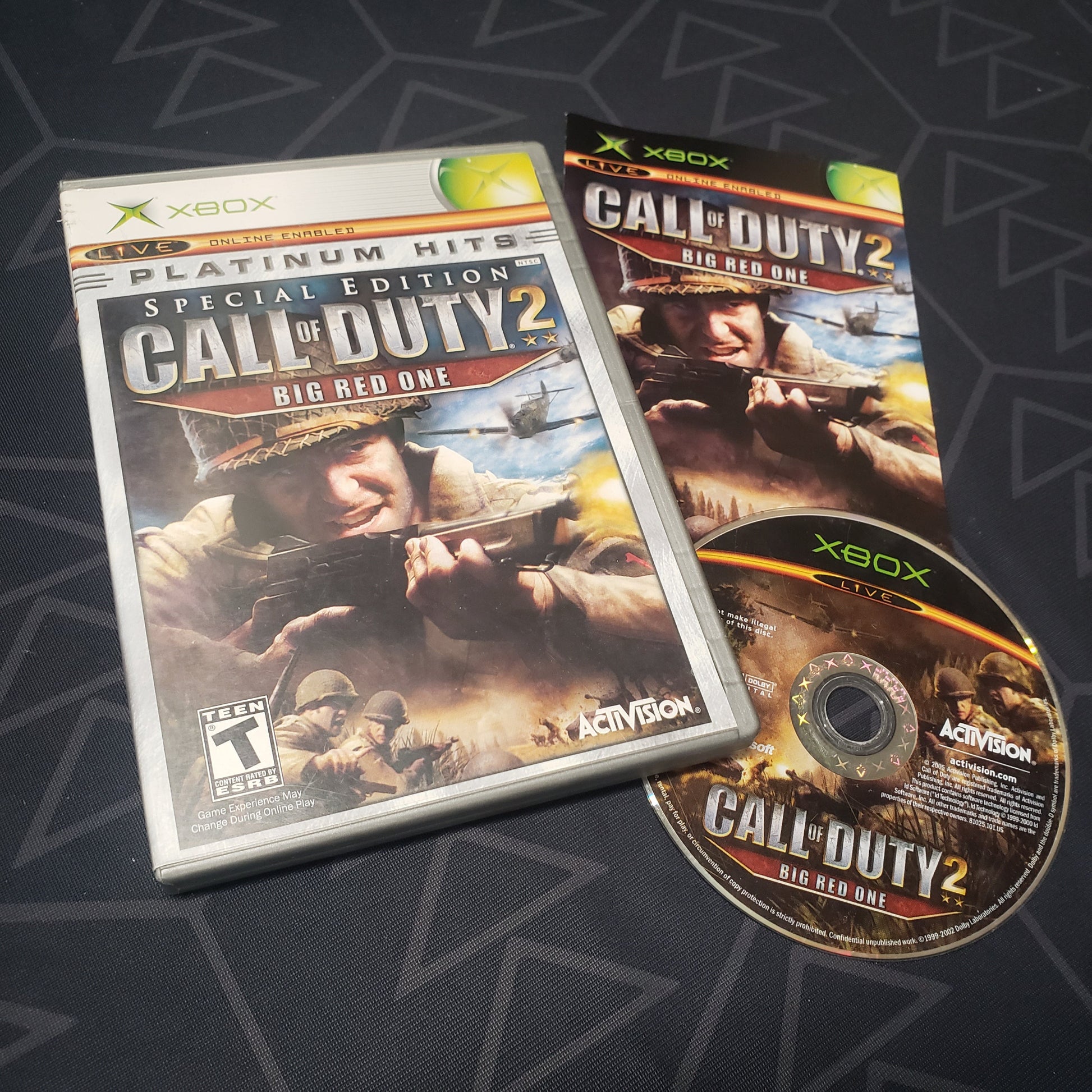 Image shows the case, manual and disc for the video game Call of Duty 2: Big Red One for the original Xbox