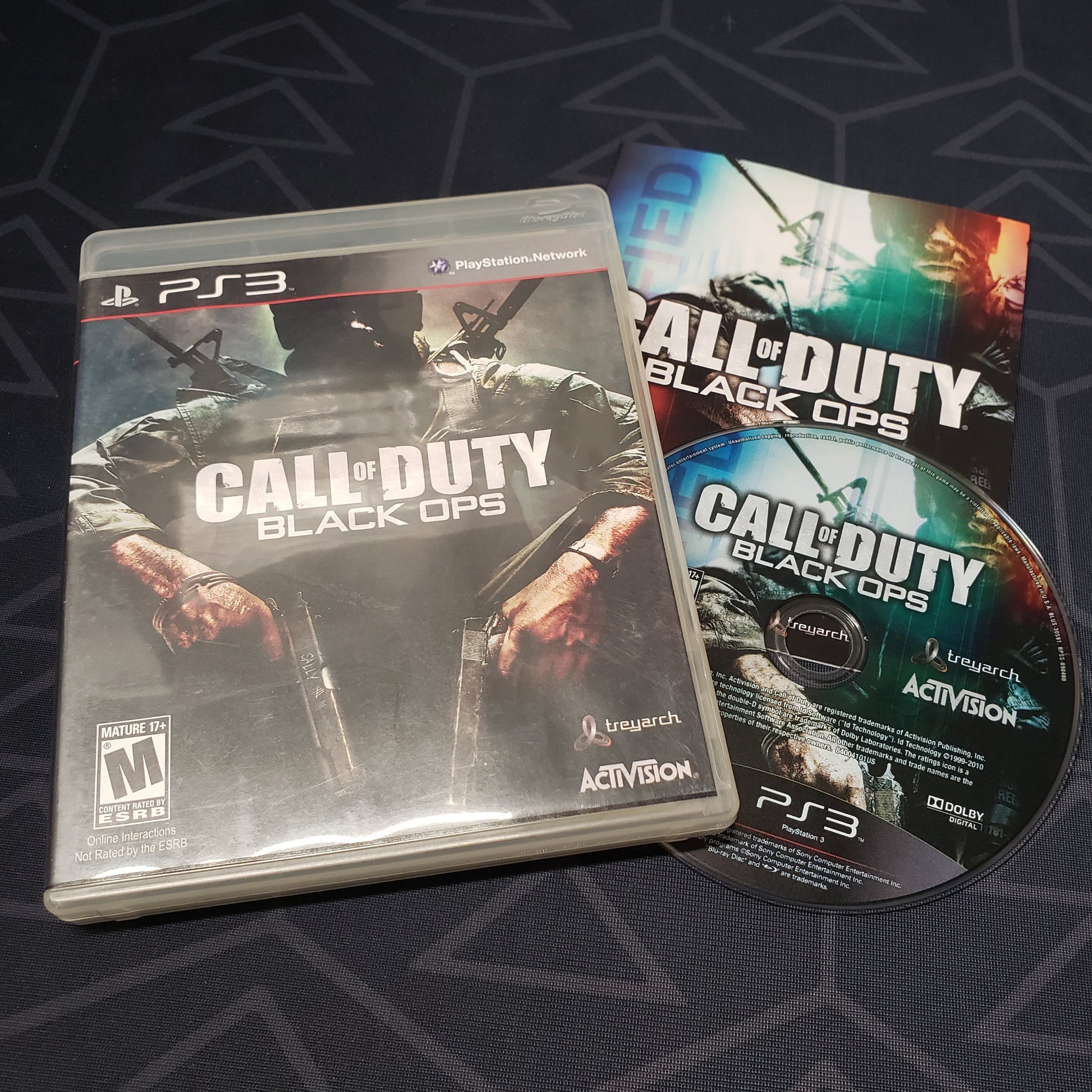 Image shows the case, manual and disc for the video game Call of Duty: Black Ops for Playstation 3