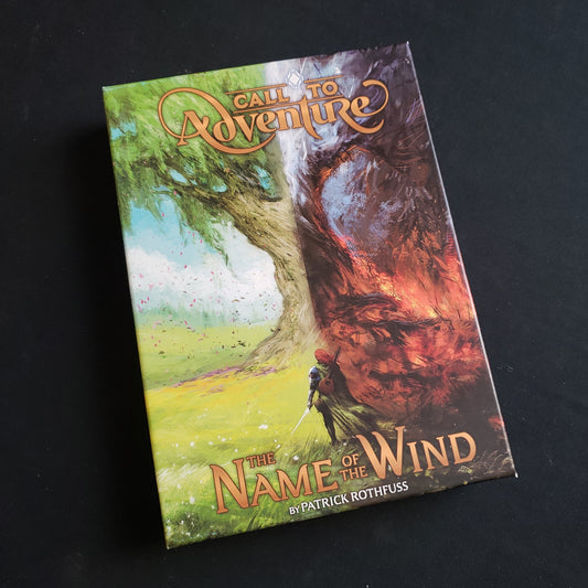Image shows the front cover of the box of the Name of the Wind expansion for the card game Call to Adventure