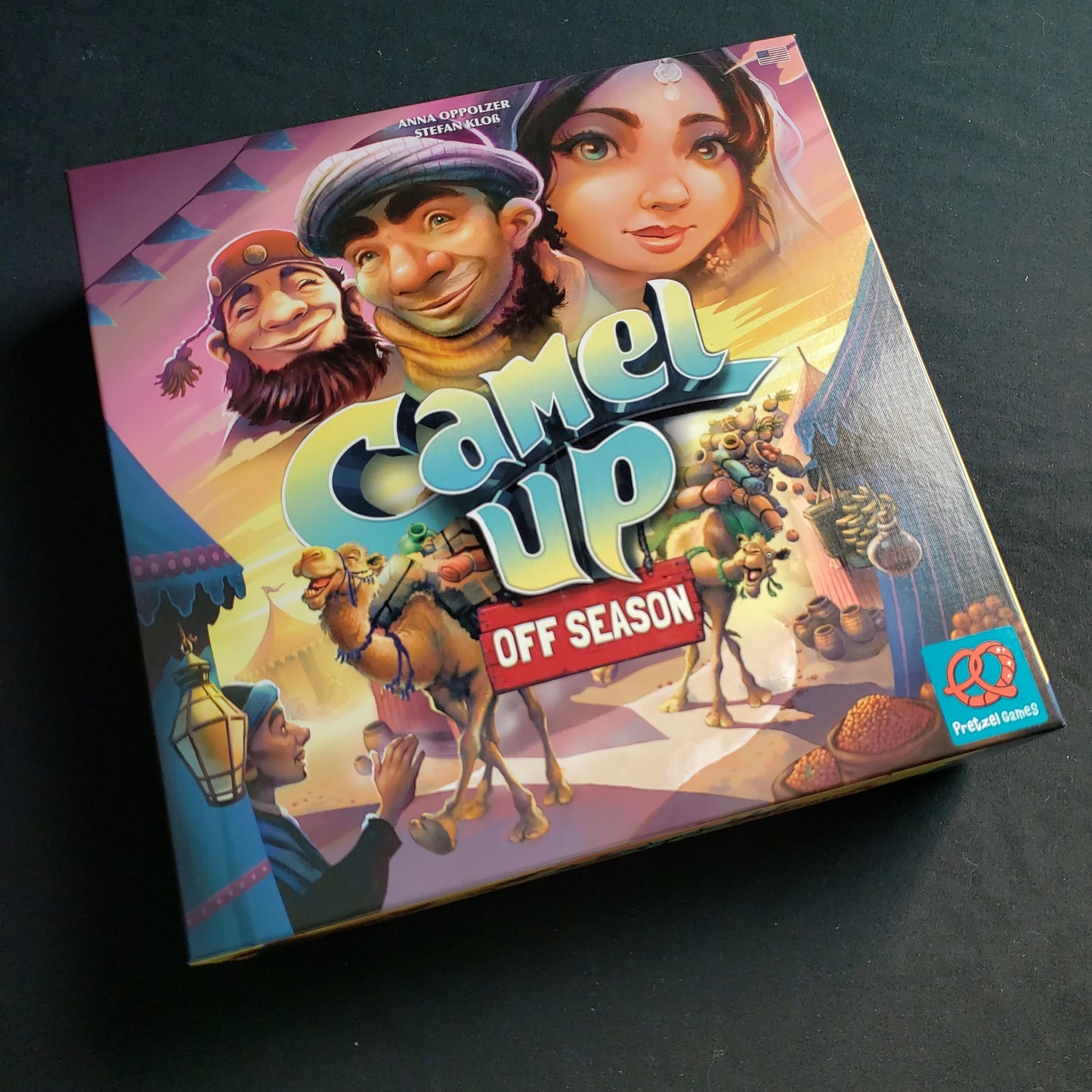 Image shows the front cover of the box of the Camel Up: Off Season board game