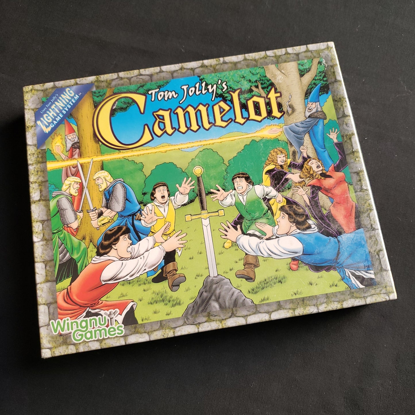 Image shows the front cover of the box of the Camelot board game