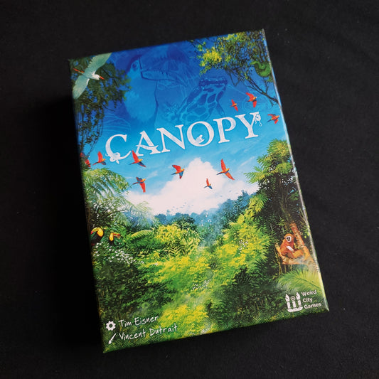 Image shows the front cover of the box of the Canopy board game