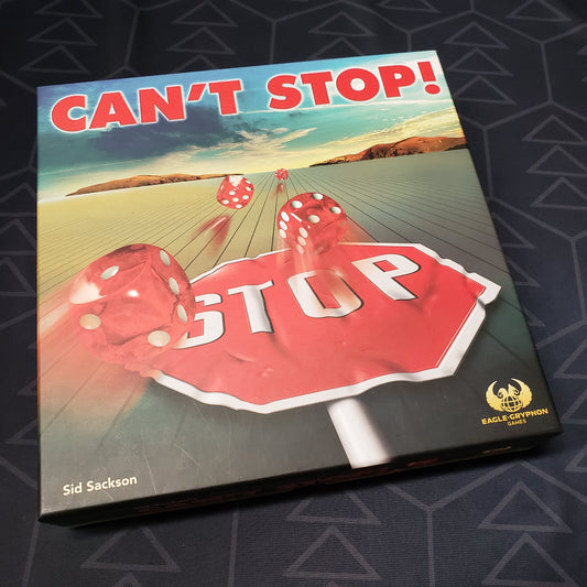Image shows the front cover of the box for the Can't Stop! board game