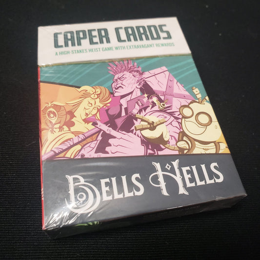 Image shows the front cover of the box of the Caper Cards: Bells Hells card game