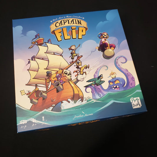 Image shows the front cover of the box of the Captain Flip board game