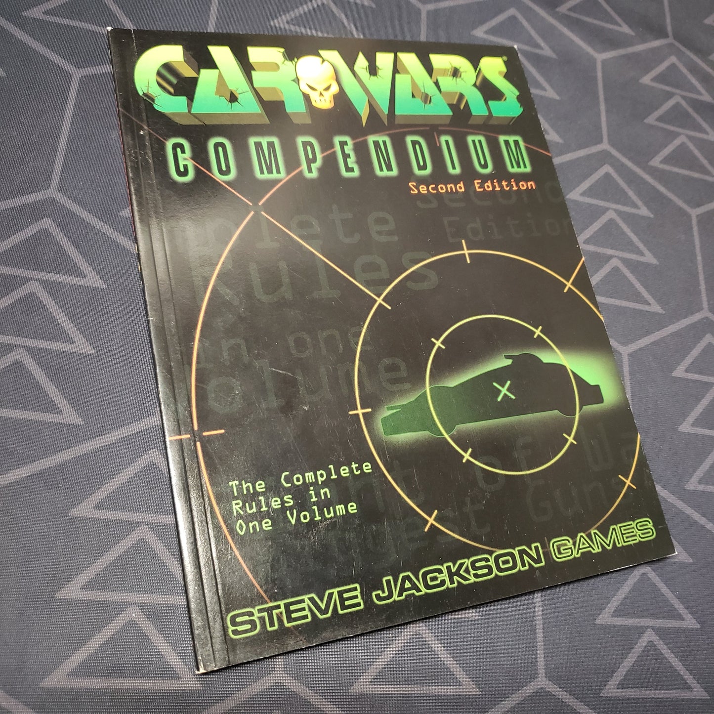 Image shows the front cover of the Car Wars: Compendium (Second Edition) roleplaying game book