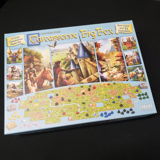 Image shows the front cover of the 2017 Sixth Edition Big Box for the board game Carcassonne
