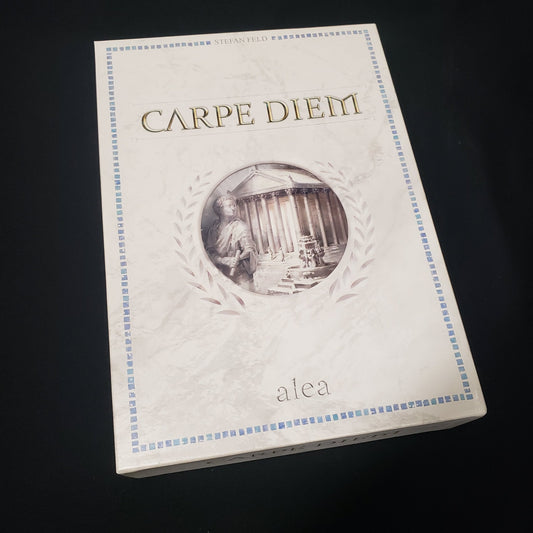 Image shows the front cover of the box of the board game Carpe Diem (Second Edition)