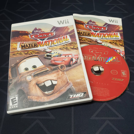 Image shows the case, manual & disc for the video game Cars: Mater-National Championship for Nintendo Wii
