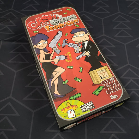 Image shows the front of the box for the Team Spirit expansion for the game Cash ‘n Guns