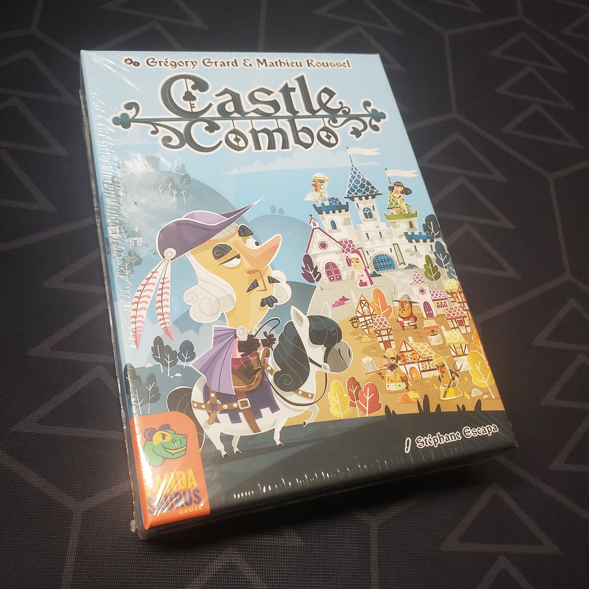 Image shows the front cover of the box for the Castle Combo card game