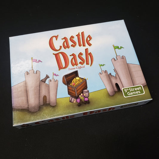 Image shows the front cover of the box of the Castle Dash board game