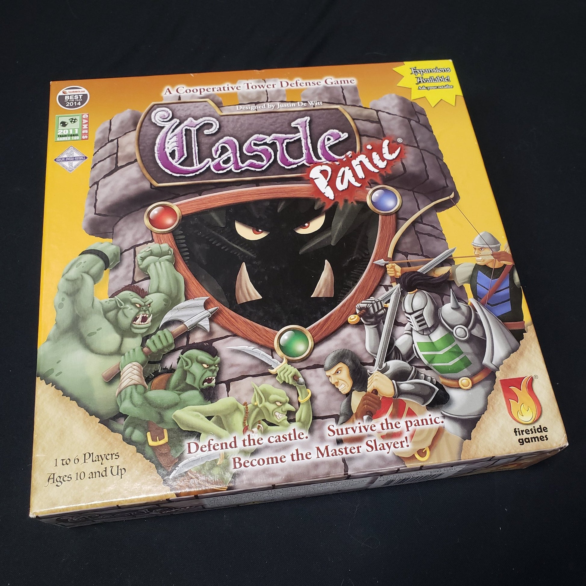 Image shows the front cover of the box of the Castle Panic board game