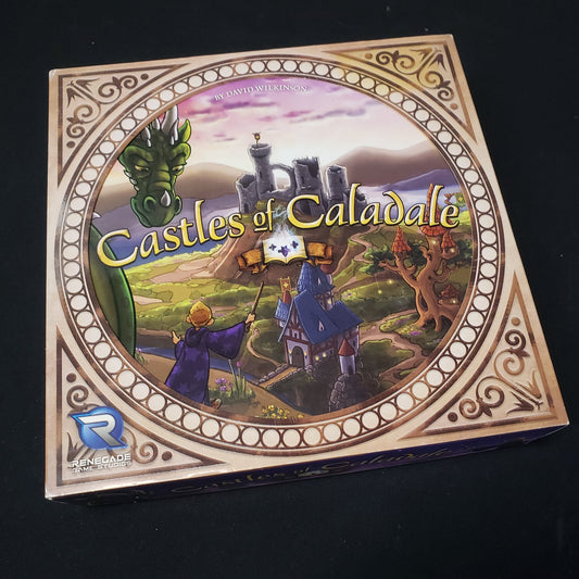 Image shows the front cover of the box of the Castles of Caladale board game