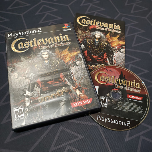 Image shows the case, manual and disc for the video game Castlevania: Curse of Darkness for Playstation 2