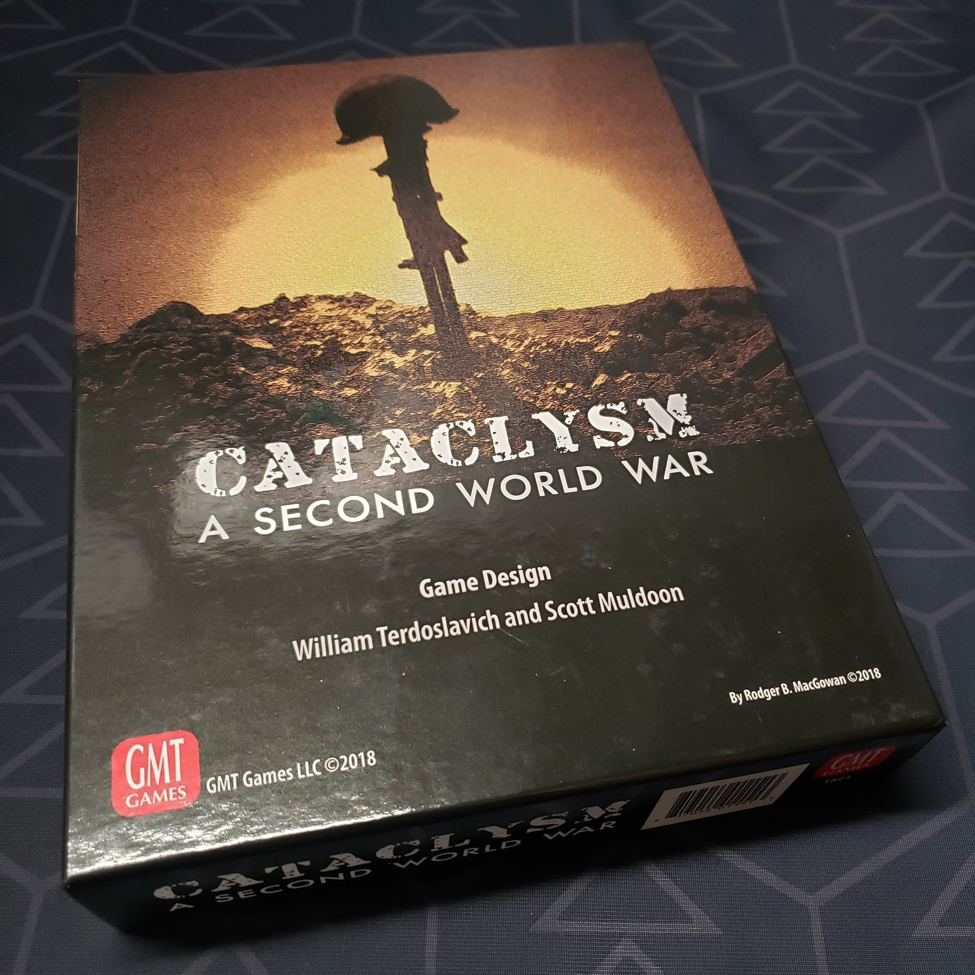 Image shows the front cover of the box of the board game Cataclysm: A Second World War