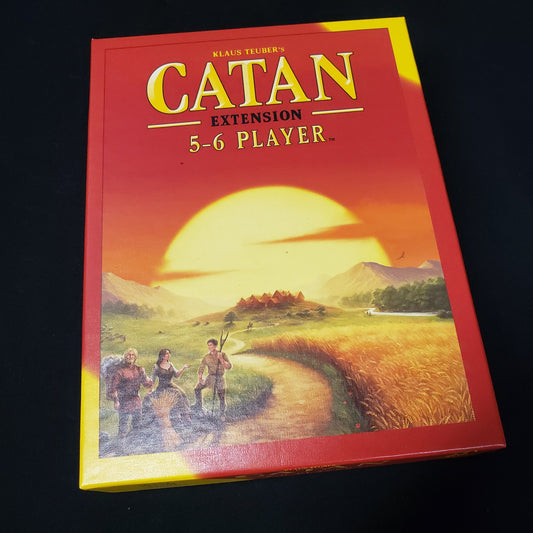 Image shows the front cover of the box of the 5-6 Player Extension for the board game Catan
