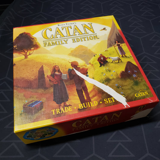Image shows the front cover of the box for the Catan: Family Edition board game