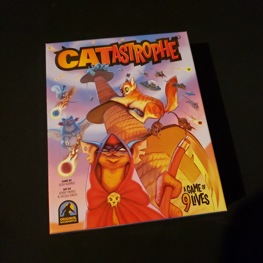 Image shows the front cover of the box of the CATastrophe board game