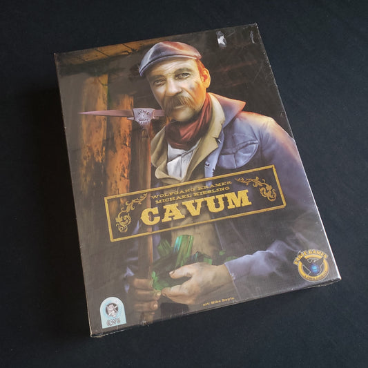 Image shows the front cover of the box of the Cavum board game