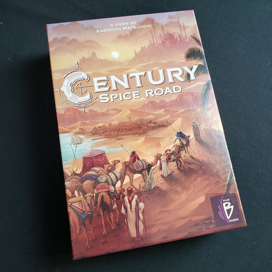 Image shows the front cover of the box of the Century: Spice Road board game