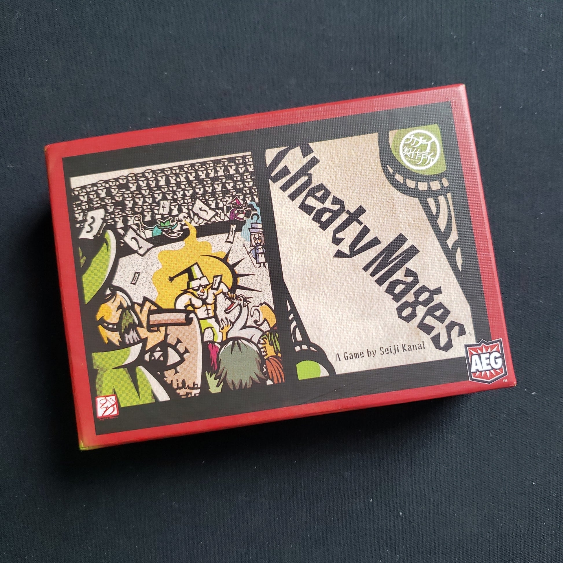 Image shows the front cover of the box of the Cheaty Mages card game