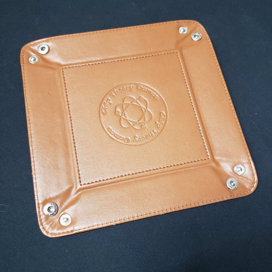 Image shows an unsnapped leather dice tray lying flat