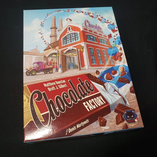 Image shows the front cover of the box of the Chocolate Factory board game