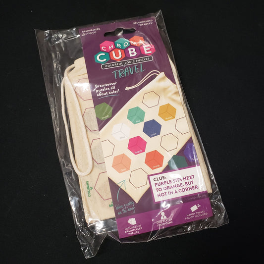 Image shows the front cover of the box of the Chroma Cube: Travel game