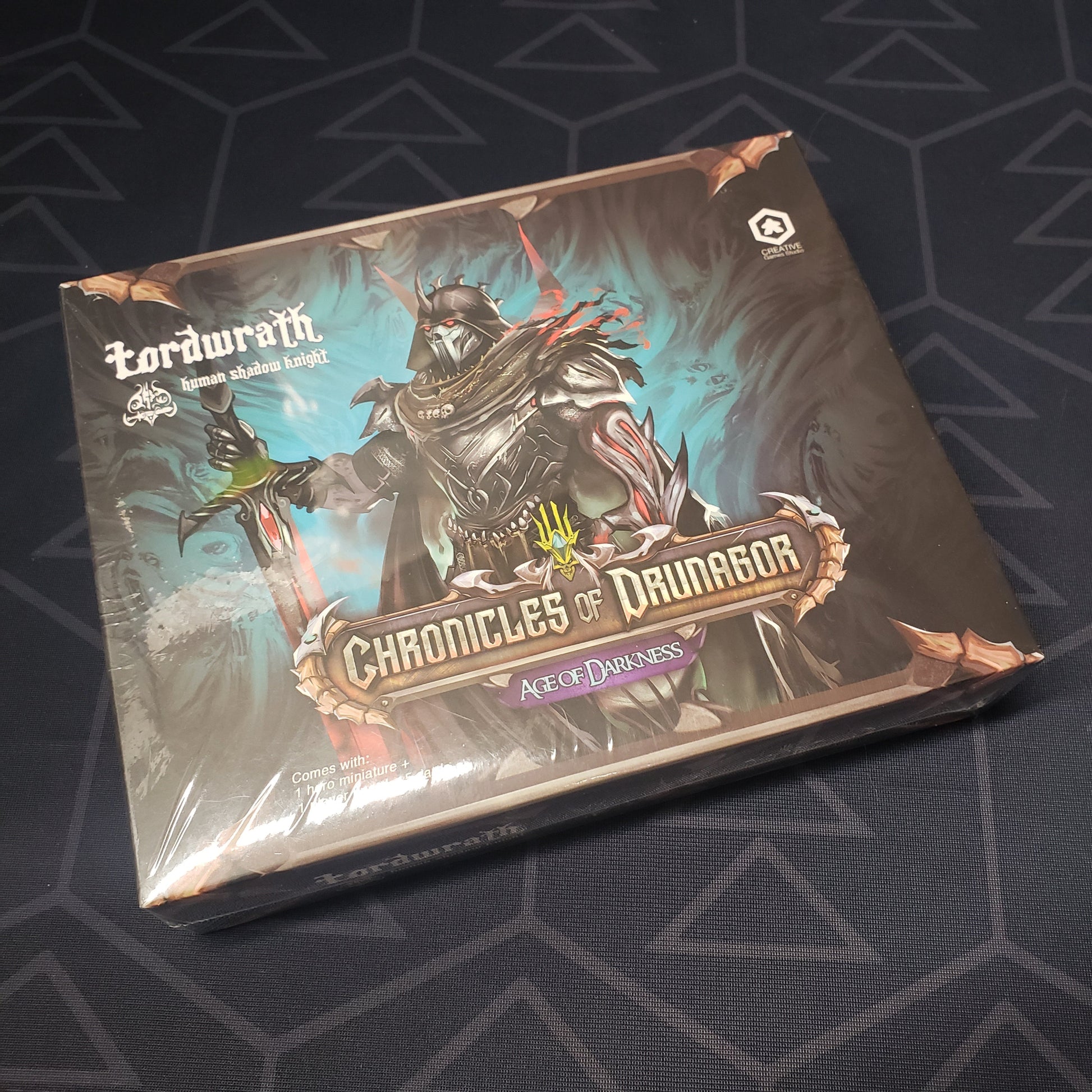 Image shows the front cover of the box of the Lordwrath, Human Shadow Knight expansion for the board game Chronicles of Drunagor: Age of Darkness