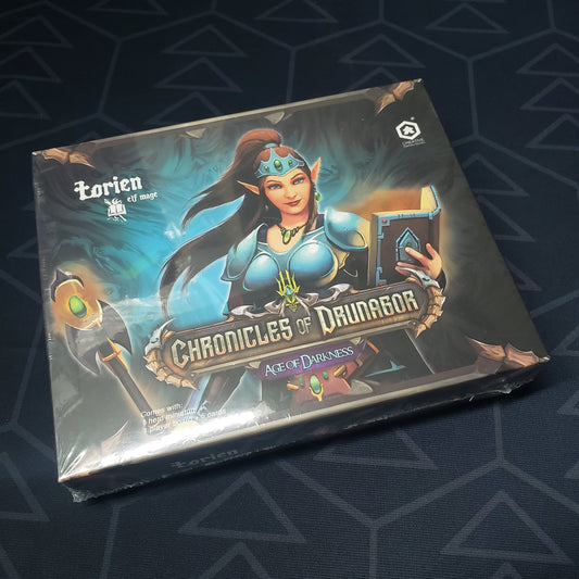 Image shows the front cover of the box of the Lorien, Elf Mage expansion for the board game Chronicles of Drunagor: Age of Darkness