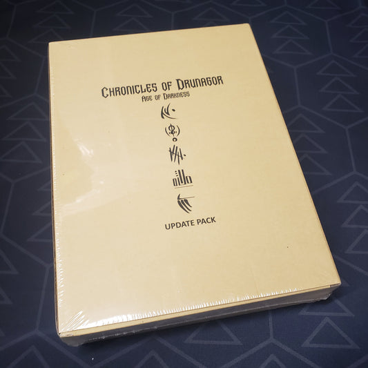 Image shows the front cover of the box of the Update Pack for the board game Chronicles of Drunagor: Age of Darkness