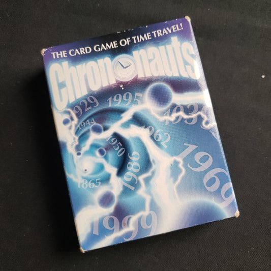 Image shows the front cover of the box of the Chrononauts card game