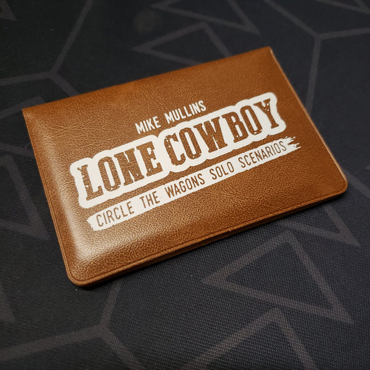 Image shows the front of the card wallet for the Lone Cowboy expansion for the card game Circle the Wagons