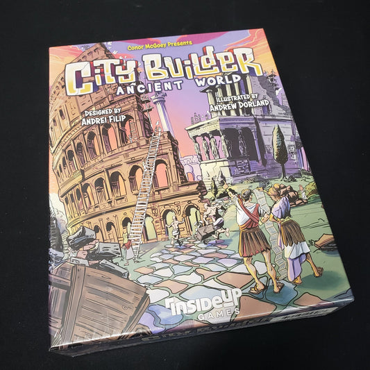 Image shows the front cover of the box of the City Builder: Ancient World board game