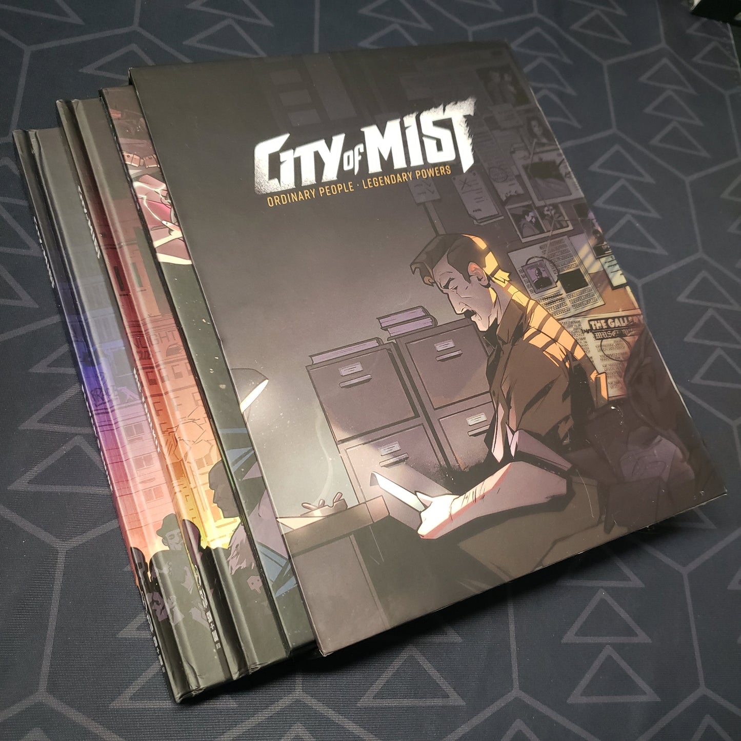Image shows the front cover of the Premium Core Set box for the roleplaying game City of Mist
