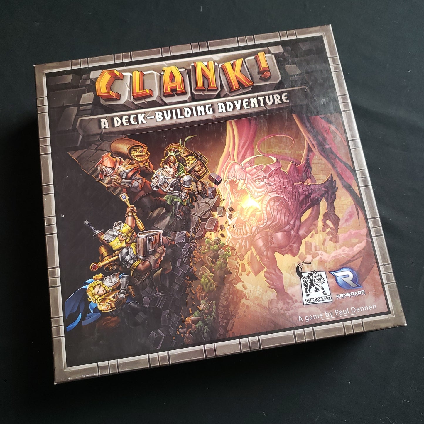 Image shows the front cover of the box of the Clank! board game