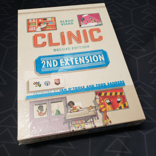 Image shows the front of the box for the 2nd Extension expansion for the board game Clinic: Deluxe Edition