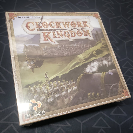 Image shows the front cover of the box for the Clockwork Kingdom board game