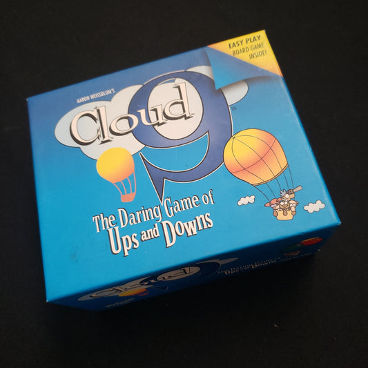 Image shows the front cover of the box of the Cloud 9 card game