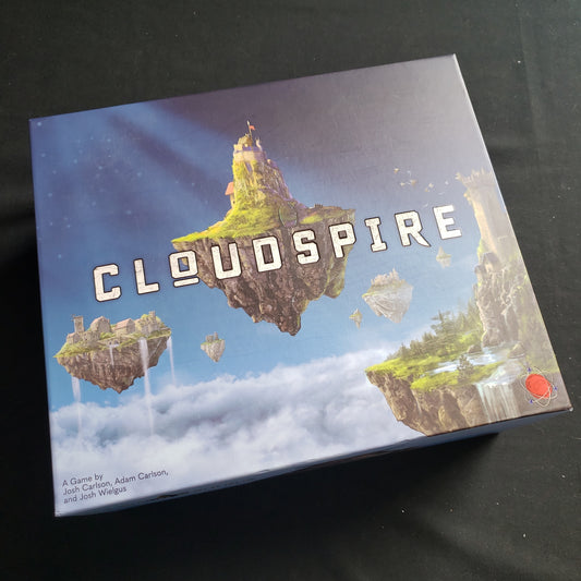 Image shows the front cover of the box of the Cloudspire board game
