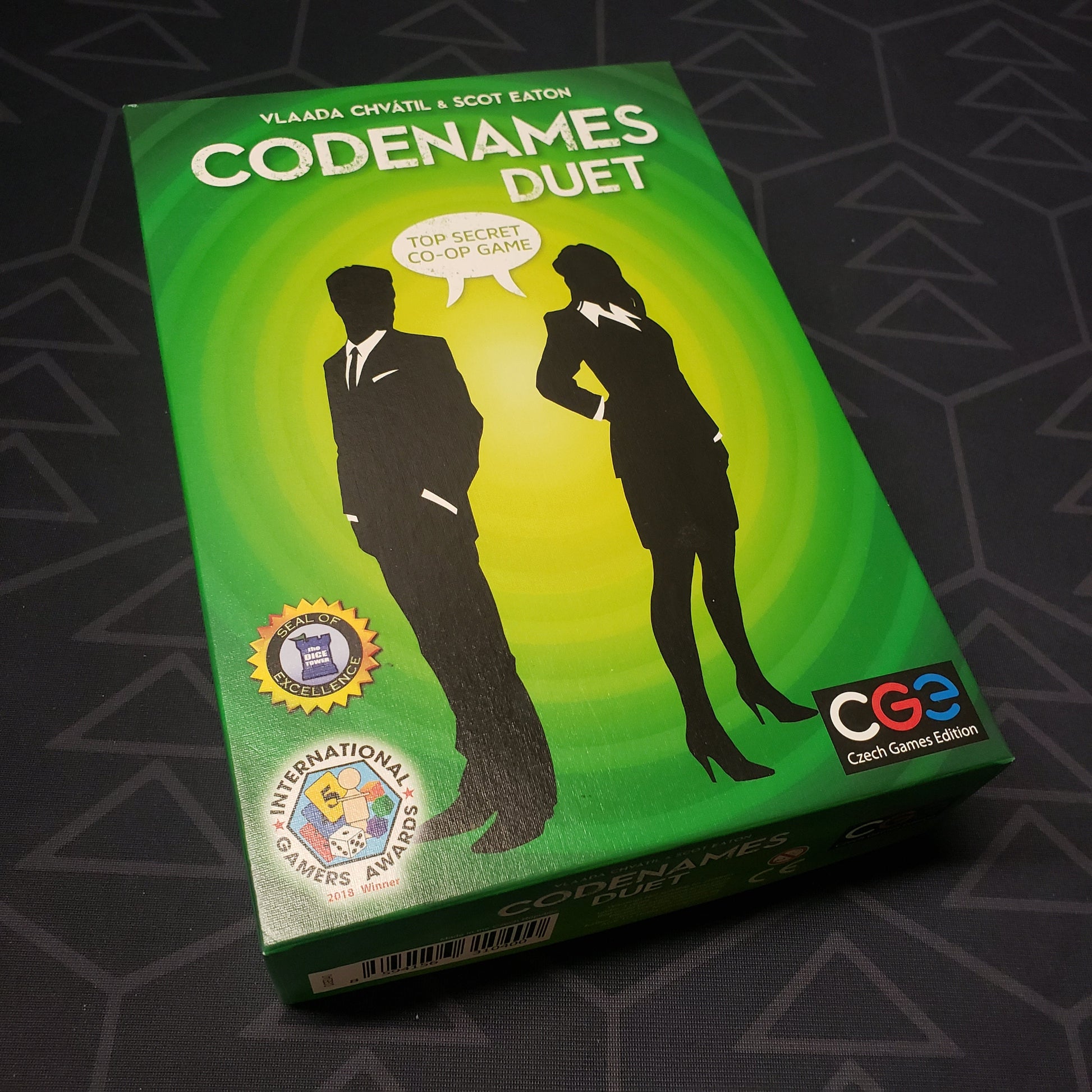 Image shows the front cover of the box for the Codenames Duet card game