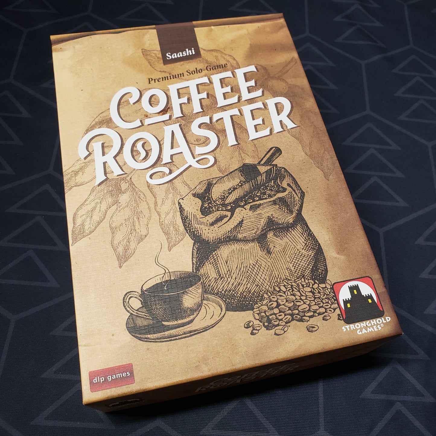 Image shows the front cover of the box for the Coffee Roaster board game
