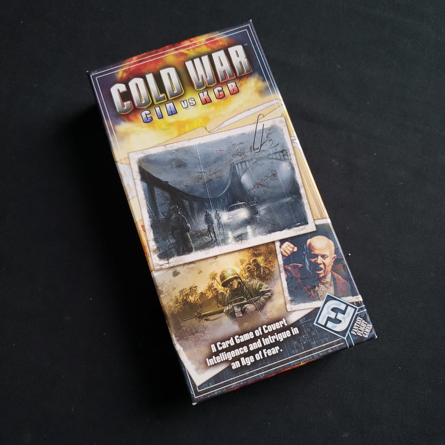 Image shows the front cover of the box of the Cold War: CIA vs KGB card game