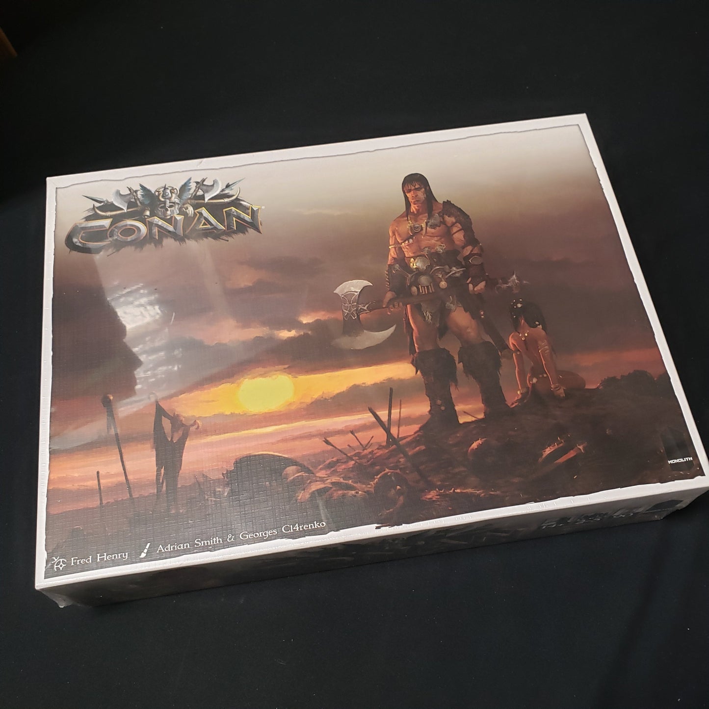 Image shows the front of the box of the King's Pledge Collector's Box expansion for the board game Conan