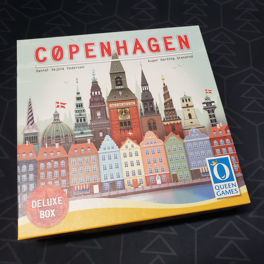 Image shows the front cover of the box for the Copenhagen (Deluxe Box) board game