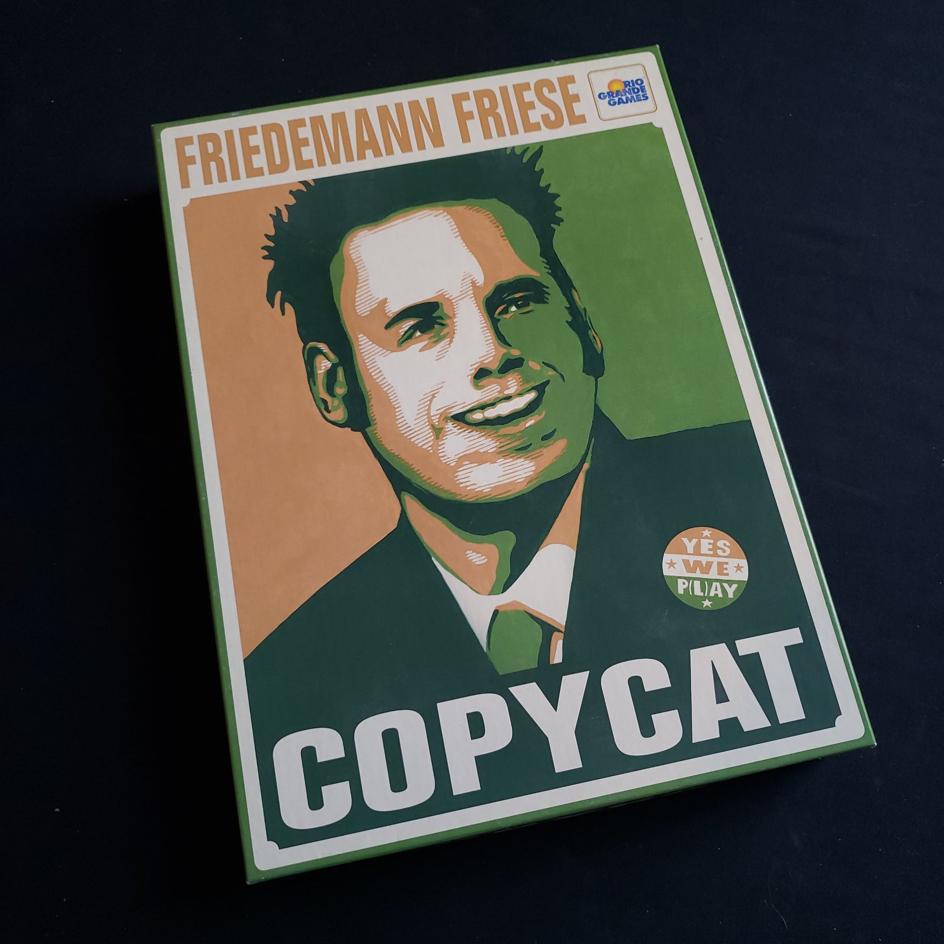 Image shows the front cover of the box of the Copycat board game