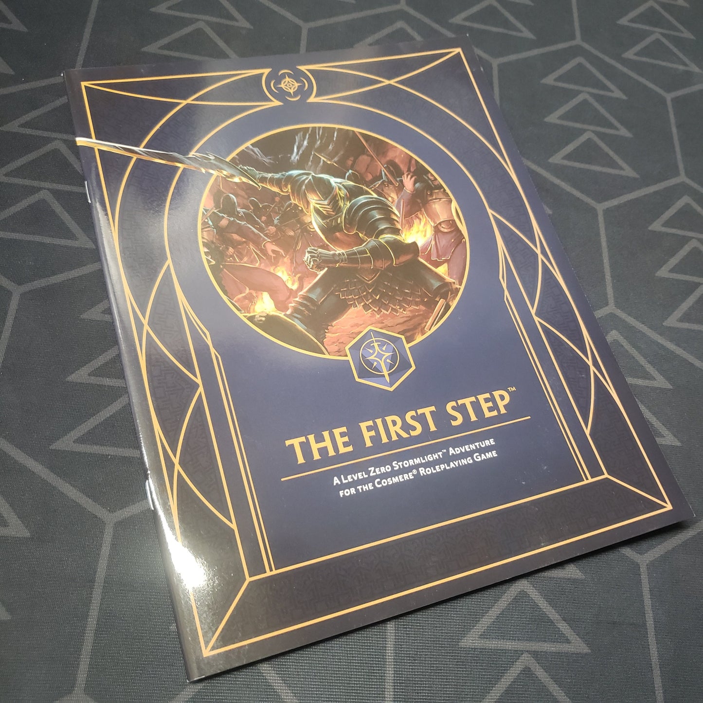 Image shows the front cover of the First Step book for the roleplaying game Cosmere