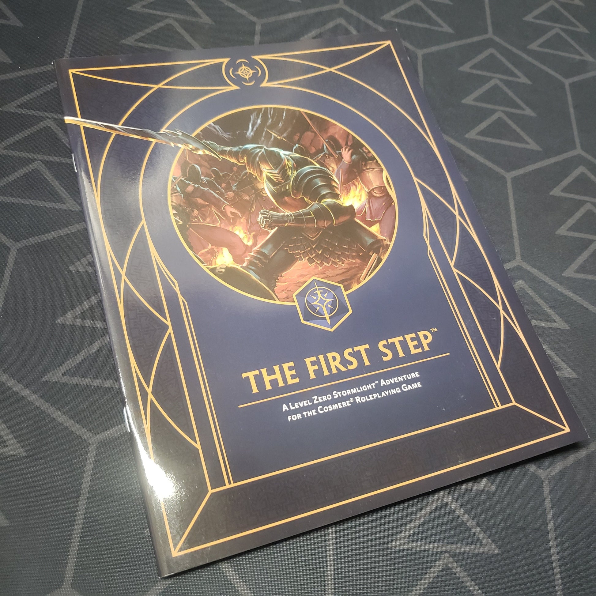 Image shows the front cover of the First Step book for the roleplaying game Cosmere