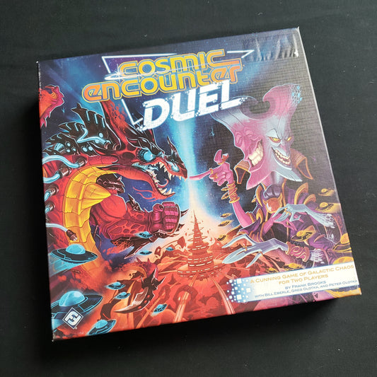 Image shows the front cover of the box of the Cosmic Encounter Duel board game